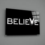 Motivational typography panel anchoring a home office wall