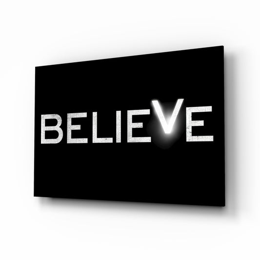 Believe glass wall art in a modern study