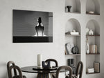 Editorial glass print bringing modern-luxe edge to a feminine living room