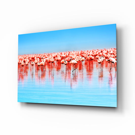 Flamingos glass wall art in a modern coastal home