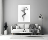 Close-up detail of frosted-glass woman silhouette behind glass