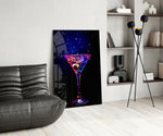 Neon-bar glass print bringing cocktail edge to a moody dining room