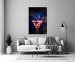 Close-up detail of ember-indigo martini splash behind glass