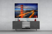 Golden Gate Bridge glass wall art catching light to reveal its painted lamps