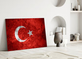 Close-up detail of grunge Turkish flag behind glass