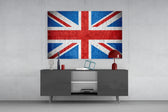 Flag of the United Kingdom glass wall art catching light to reveal its painted crosses