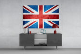 Flag of the United Kingdom glass wall art catching light to reveal its painted crosses