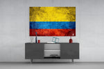 Flag of Colombia glass wall art catching light to reveal its painted grunge