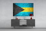 Flag of Bahamas glass wall art catching light to reveal its painted stone-grunge