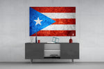 Flag of Puerto Rico glass wall art catching light to reveal its painted stone-grunge