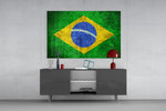 Flag of Brasil glass wall art catching light to reveal its painted scratched-metal grunge