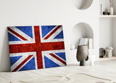 Close-up detail of scratched-metal Union Jack behind glass