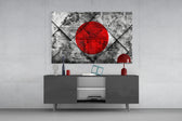 Flag of Japan glass wall art catching light to reveal its painted concrete grunge