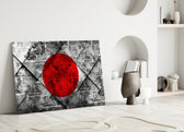 Close-up detail of monochrome diamond-tile Hinomaru behind glass