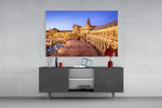 Sevilla glass wall art catching light to reveal its painted twilight tones