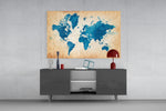 World Map glass wall art catching light to reveal its painted parchment tones