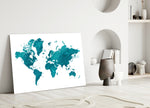 Close-up detail of teal watercolour continents behind glass