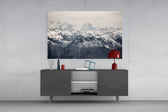 Snowy Mountains glass wall art catching light to reveal its painted ridges
