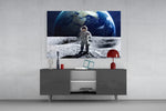 Space Walk glass wall art catching light to reveal its painted Earth-rise