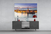 Stockholm glass wall art catching light to reveal its painted twilight tones
