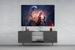 Space Clouds glass wall art catching light to reveal its painted nebula tones
