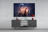 Space Clouds glass wall art catching light to reveal its painted nebula tones