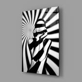 Op-art editorial panel anchoring a creative loft wall
