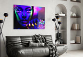Neon Woman artwork styled in a bedroom interior