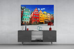 Stockholm House View glass wall art catching light to reveal its painted gabled tones