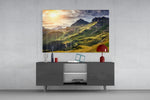 Mountain View glass wall art catching light to reveal its painted golden ridges