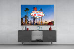 Vegas glass wall art catching light to reveal its painted neon tones