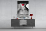 Red Lips Portrait glass wall art catching light to reveal its painted crimson