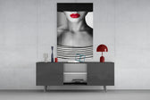 Red Lips Portrait glass wall art catching light to reveal its painted crimson