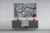 Forest Landscape glass wall art catching light to reveal its painted snow tones