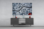 Forest Landscape glass wall art catching light to reveal its painted cool snow tones