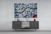 Forest Landscape glass wall art catching light to reveal its painted cool snow tones
