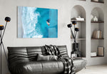 Oceanside artwork styled in a study interior