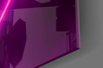 Abstract Art glass wall art catching light to reveal its painted magenta neon
