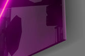 Abstract Art glass wall art catching light to reveal its painted magenta neon