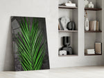 Botanical dikey panel against a charcoal-painted accent wall