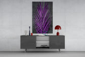 Areca Bunch glass wall art catching light to reveal its painted violet frond