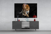 Tiger glass wall art catching light to reveal its painted amber coat