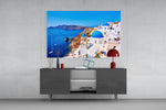 Santorini glass wall art catching light to reveal its painted blue domes