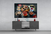 Nuts glass wall art catching light to reveal its painted pantry tones