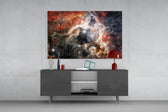 Space Purple glass wall art catching light to reveal its painted nebula tones