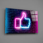 Magenta-cyan thumbs-up sign glass wall art over modern teen-lounge sofa