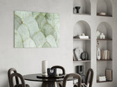 Scandinavian botanical cinematic glass wall art in light-filled garden room