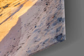 Coastal cinematic tropical glass wall art in light-filled lounge