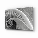 Spiral staircase concrete cinematic glass wall art above leather chair in designer office