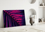 Hot-pink palm cinematic glass wall art in dramatic dining room